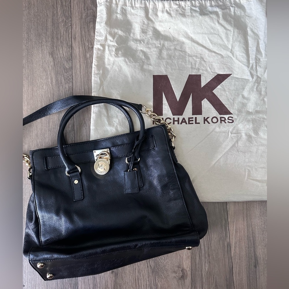 Michael Kors bag. This is a classic. It is the large one. Comes with dust bag